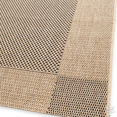 Belgium Verandah Black Straw polypropylene rug with woven straw pattern, showcasing its textured black design and durable material.